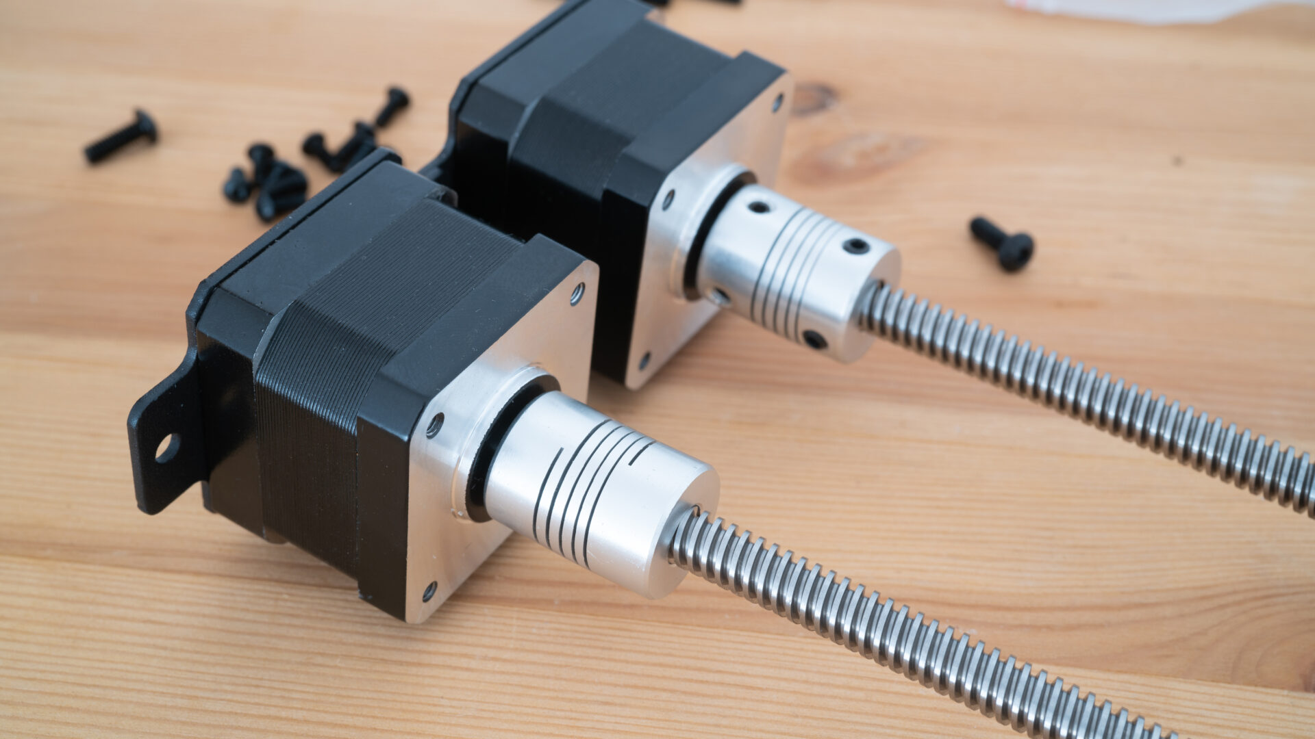 Stepper motors and ball screws