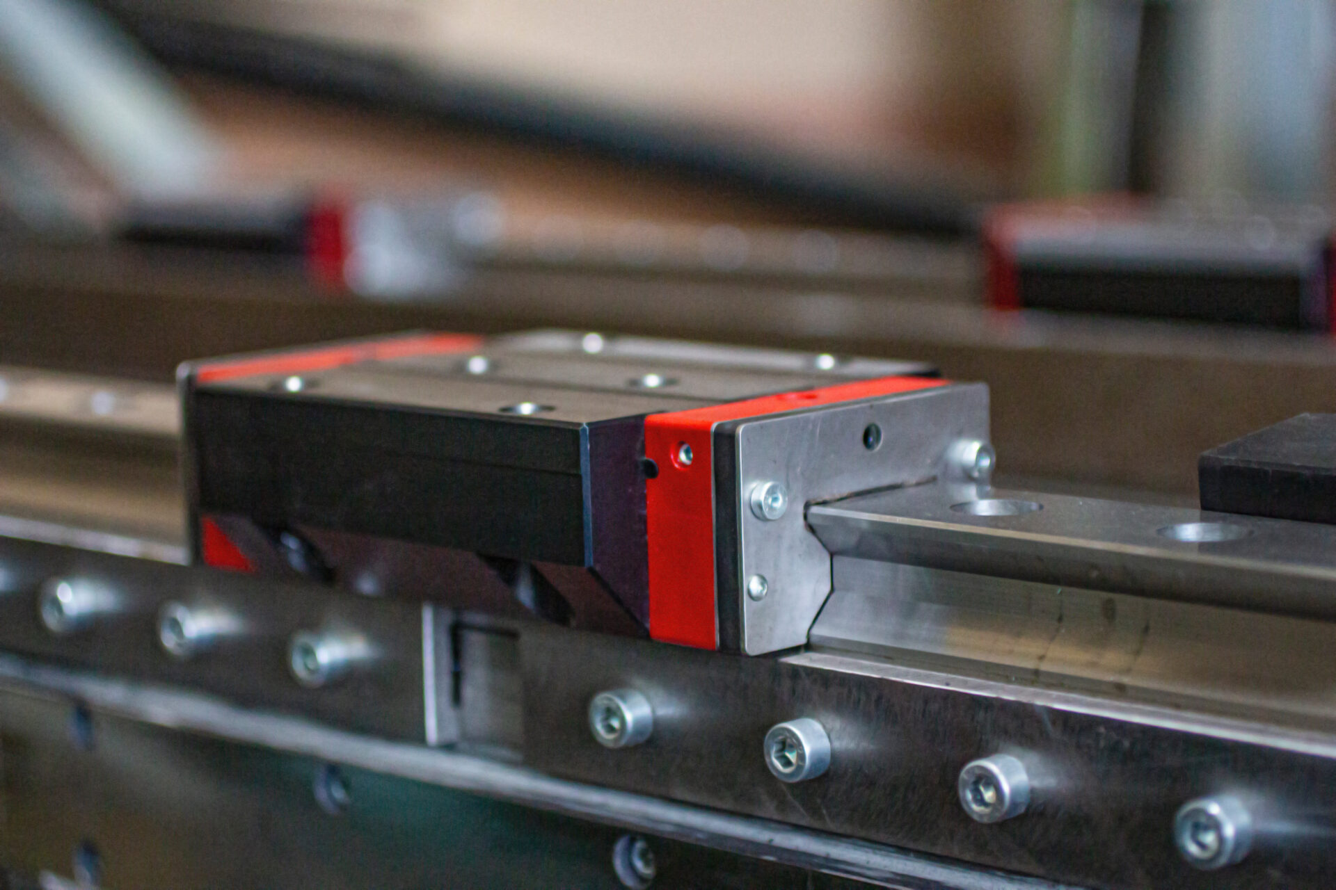 Rail guides for precision machines